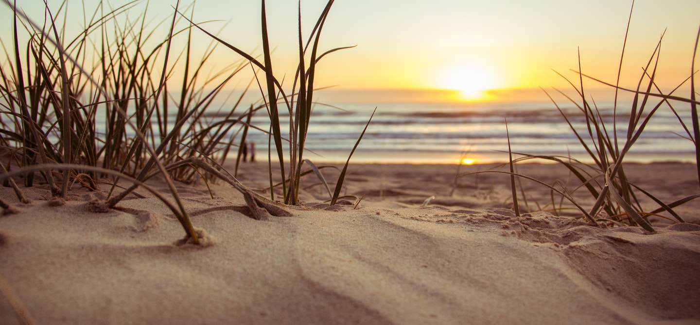 Sand with sunset background